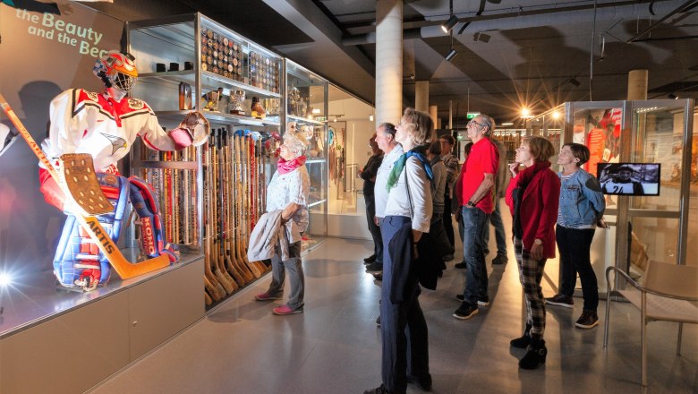 Winter Sports Museum, © Karoline Karner Visitors view an ice hockey exhibition at the Winter Sports Museum.