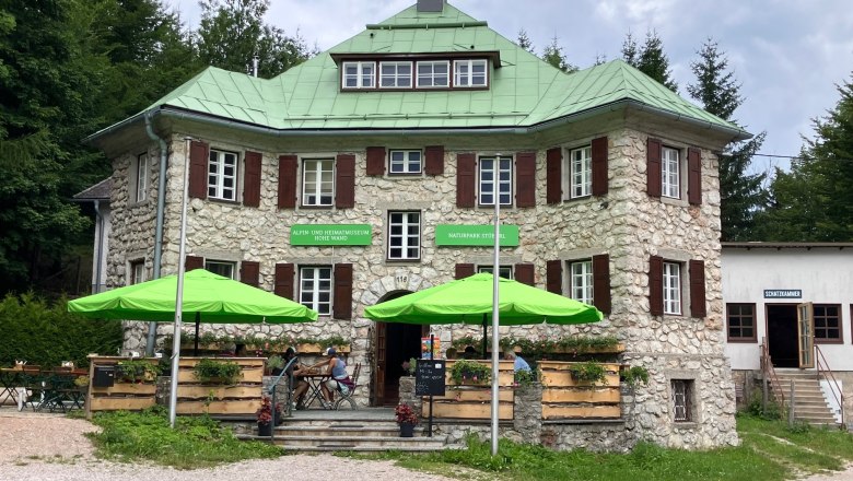 Nature park parlor, © Naturpark Hohe Wand Stone building with a green roof and sunshades in front of the entrance.