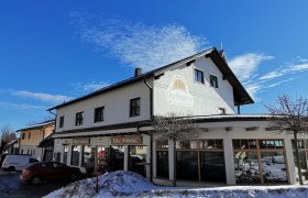 Exterior view of the Dorfstetter bakery on a sunny winter's day.