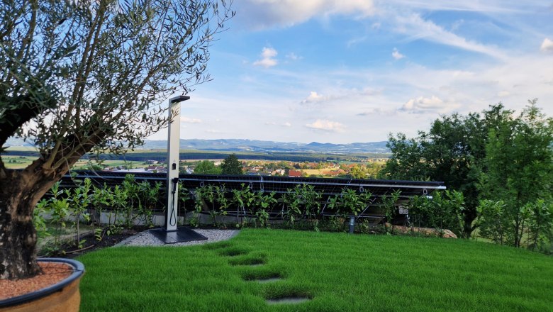 Garden with solar shower and views of the countryside.