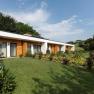 Modern guest house with garden and terrace.