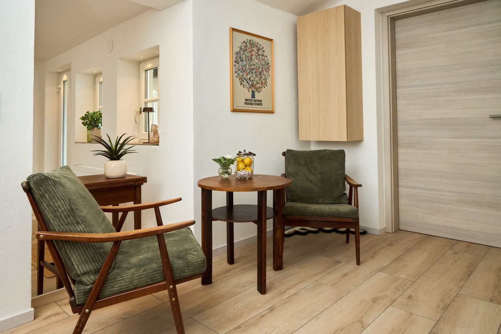 Cozy corner with 2 velvet chairs and small table